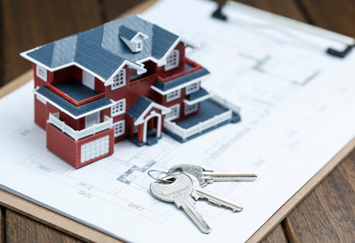mortgage form with a miniature house and keys